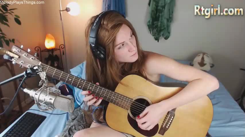 cute skinny tgirl play guitar for her fans